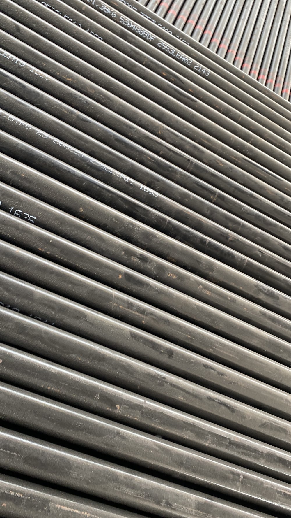 Mill stencil markings and heat numbers on OCTG steel pipe used for traceability