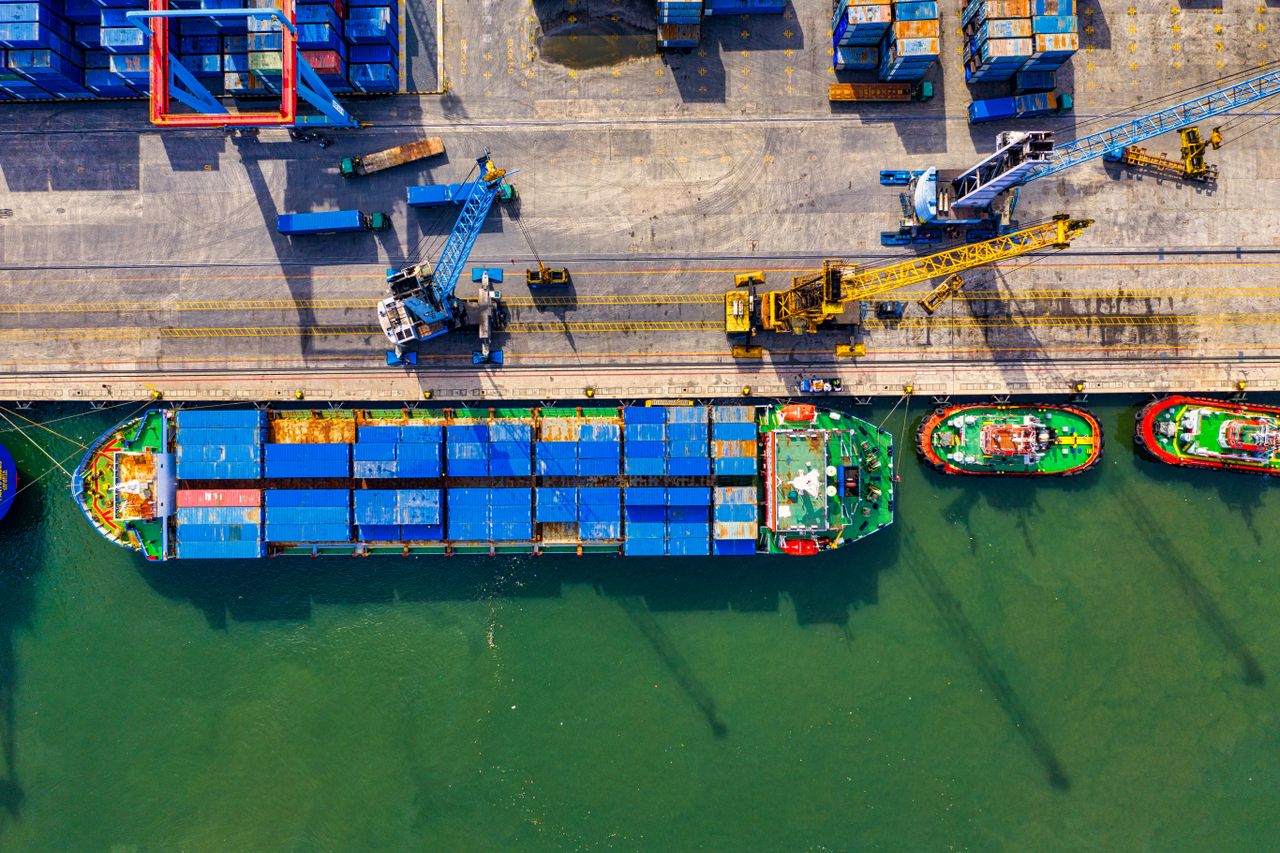 Cargo ship at dock viewed from above
