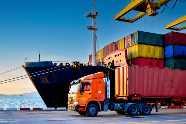 Truck carrying a container leaving a port terminal